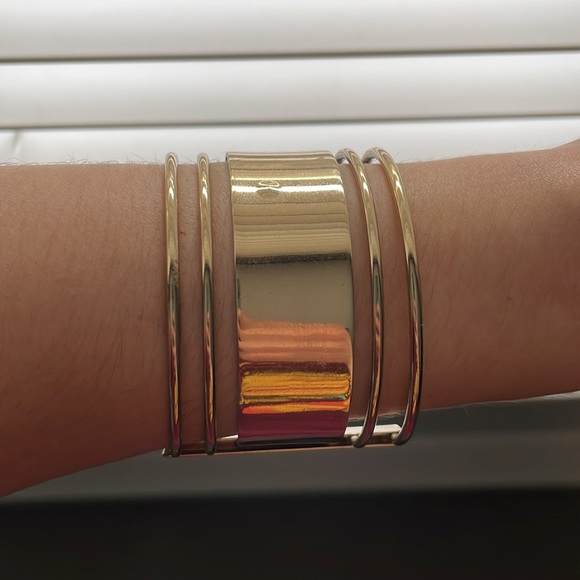 Stylish Shiny Aldo Gold Slip On Bangle Bracelet With Cut Outs - Picture 2 of 7